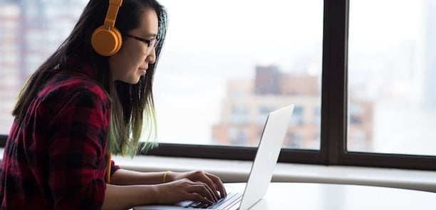 Woman using screen reader to interact on website 